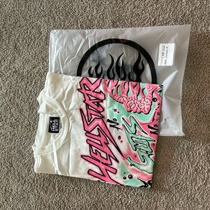 New white hell star tee shirt. I’m great condition with bag.